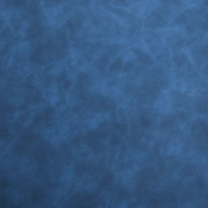 textured blue scrub leather material close-up