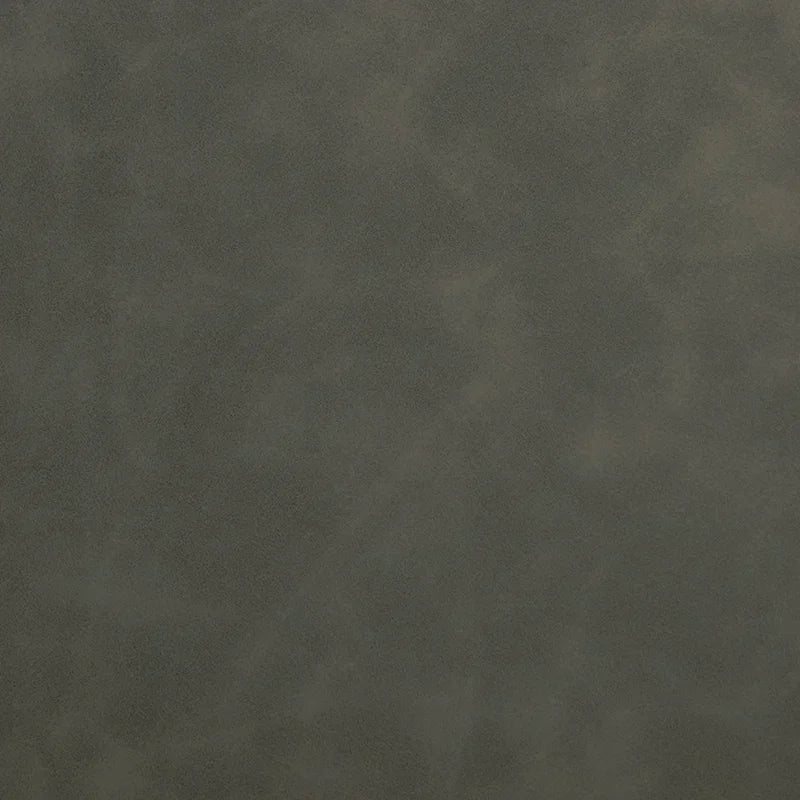 Dark gray scrub leather texture with a soft, matte, marbled finish