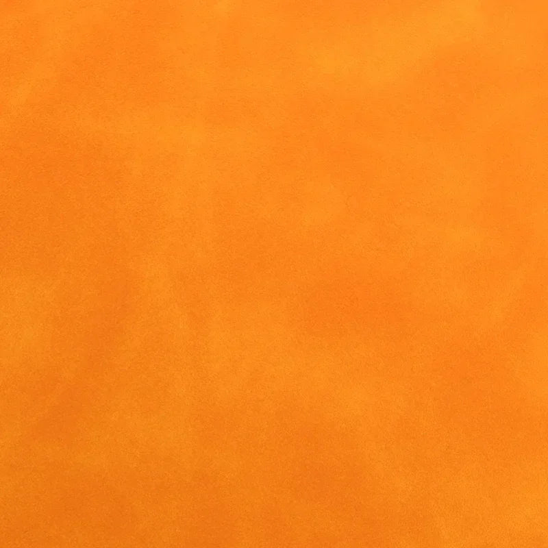 Orange scrub leather texture with soft matte finish, close-up material sample