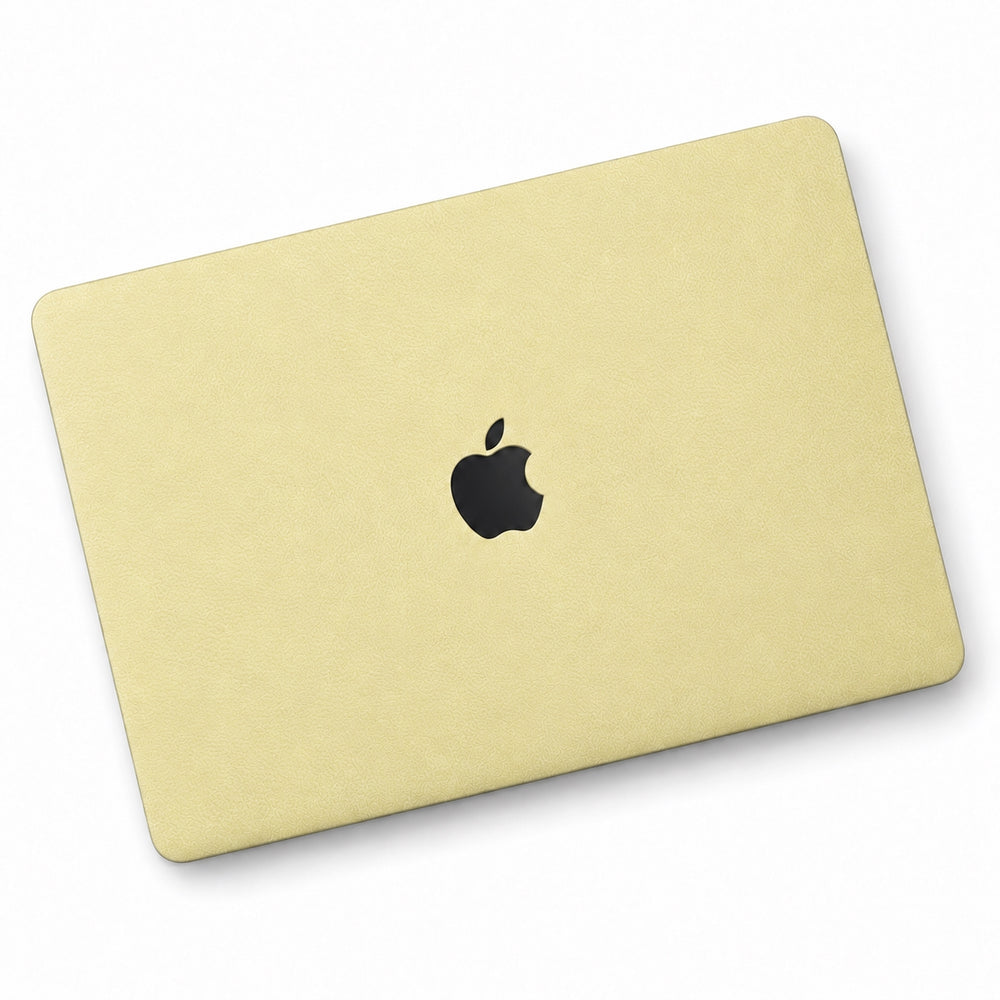 AI-assisted champagne gold MacBook skin coverage illustration: top lid only. Cut layout varies by model.
