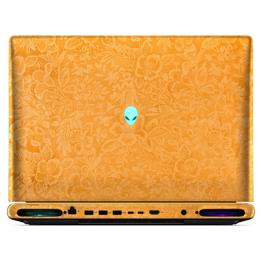 Rear view of an open Alienware 18 Area-51 (2025) with Sunny Yellow Hibiscus skin, showing the floral outer lid, rear ports and vents.