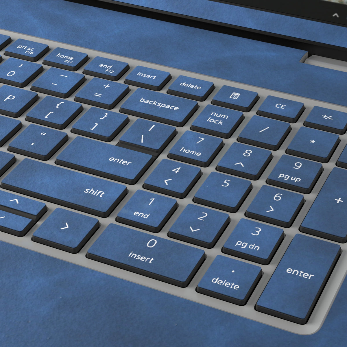 Deep Sea Blue scrub-textured synthetic leather Dell business laptop skin, macro view. Rendered on Dell Pro 16 PC16250 as a reference; exact cut layout follows the selected model and coverage.