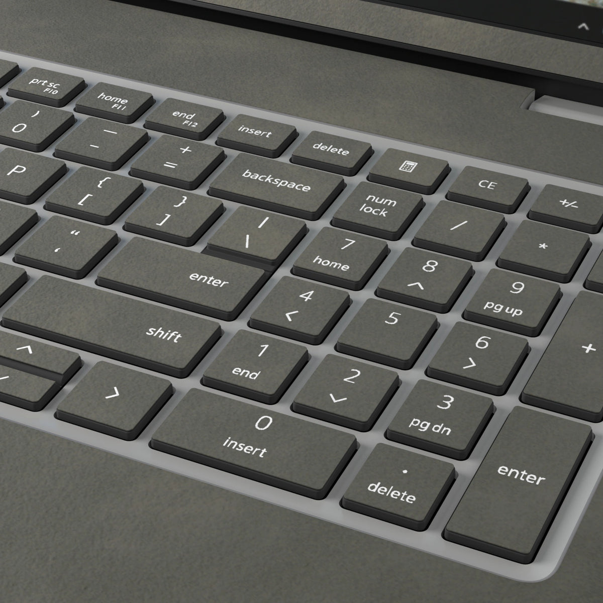 Dark Gray scrub-textured synthetic leather Dell business laptop skin, macro view. Rendered on Dell Pro 16 PC16250 as a reference; exact cut layout follows the selected model and coverage.