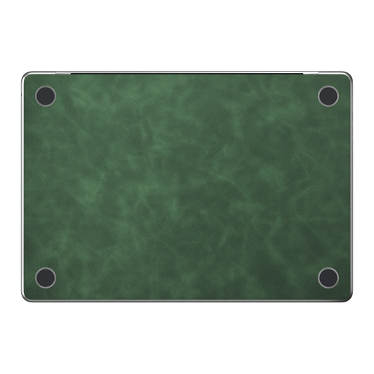Green scrub-textured synthetic leather MacBook skin. Bottom (D) material illustration; included only with bottom coverage. Air 15.3 M3-M5 shared material/installation reference; exact cutouts and included pieces follow selected model and coverage. Laptop not included.
