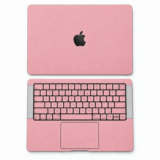 Pink synthetic leather MacBook skin illustration: lid and inside with keycaps.