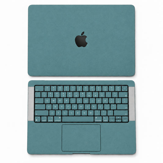Teal synthetic leather MacBook skin illustration: lid and inside with keycaps.