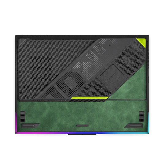 Bottom view of ASUS ROG Strix G18 laptop with black vent design and textured green scrub leather surface