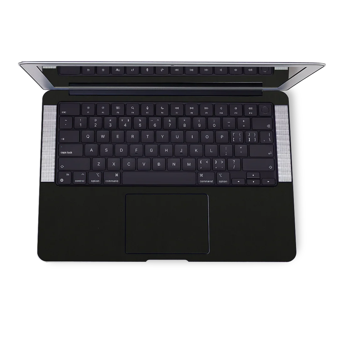 Top view of MacBook Pro 14-inch black interior with keyboard and touchpad visible