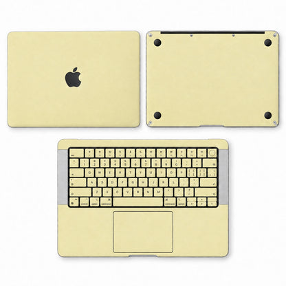 AI-assisted champagne gold MacBook skin coverage illustration: top lid, inside with keycap and power-key stickers, and bottom. Cut layout varies by model.