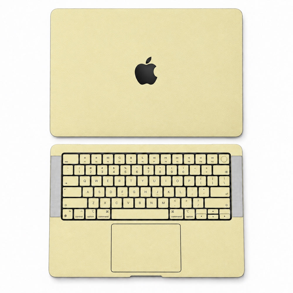 AI-assisted champagne gold MacBook skin coverage illustration: top lid and inside, including keycap and power-key stickers. Cut layout varies by model.