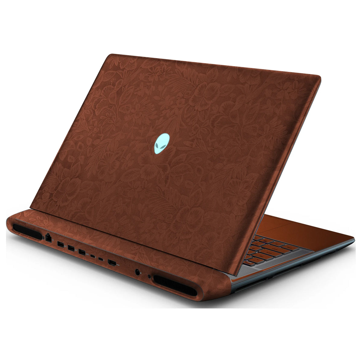 Rear right three-quarter view of an open Alienware 18 Area-51 (2025) with Classic Brown Hibiscus skin, showing the floral lid and keyboard deck to the right.