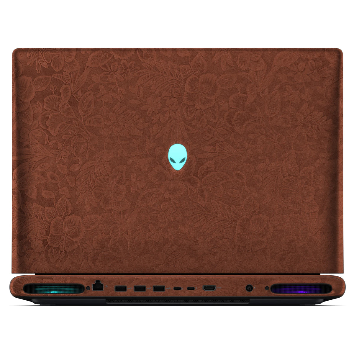 Rear view of an open Alienware 18 Area-51 (2025) with Classic Brown Hibiscus skin, showing the floral outer lid, rear ports and vents.