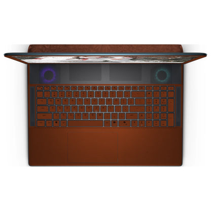 Top view of an open Alienware 18 Area-51 (2025), showing the Classic Brown keyboard keys, palm rest and touchpad skin below the dark upper grille.