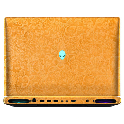 Rear view of an open Alienware 18 Area-51 (2025) with Sunny Yellow Hibiscus skin, showing the floral outer lid, rear ports and vents.
