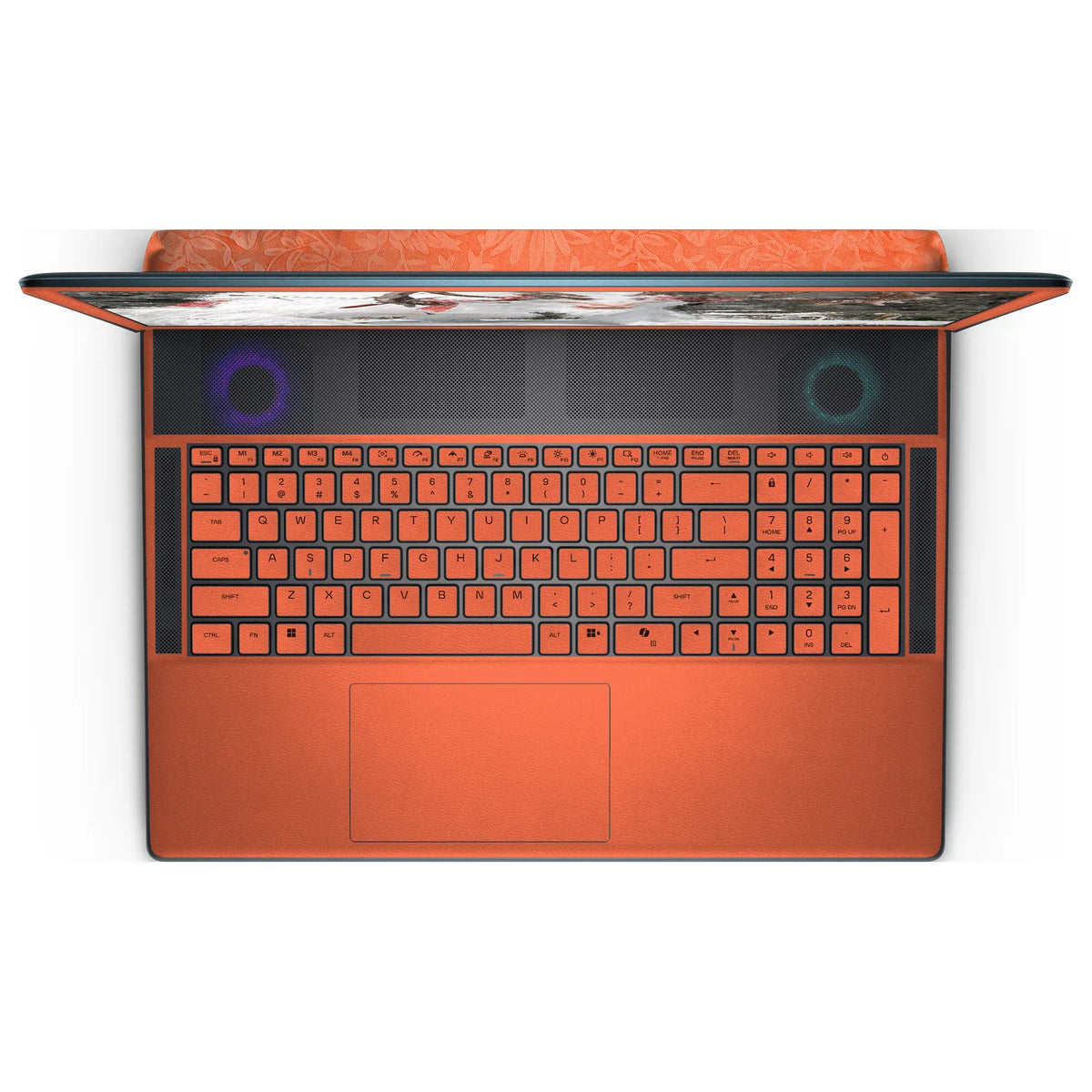 Top view of an open Alienware 18 Area-51 (2025), showing the Sunset Orange keyboard keys, palm rest and touchpad skin below the dark upper grille.