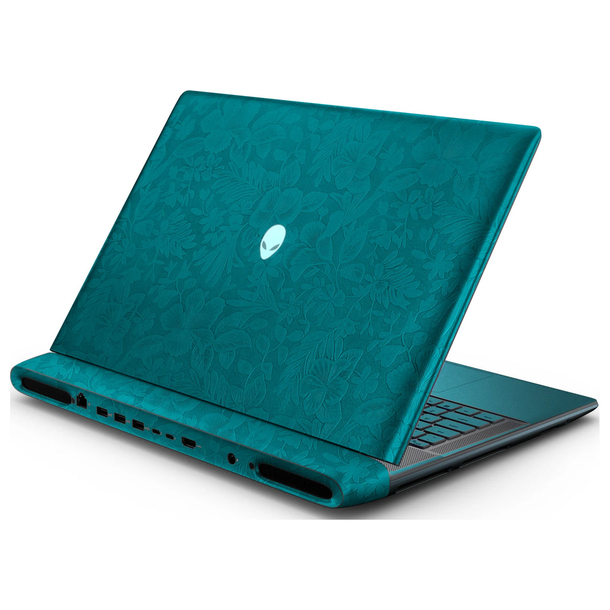 Rear right three-quarter view of an open Alienware 18 Area-51 (2025) with Tropical Teal Hibiscus skin, showing the floral lid and keyboard deck to the right.