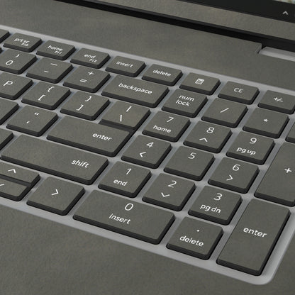 Dark Gray scrub-textured synthetic leather Dell business laptop skin, macro view. Rendered on Dell Pro 16 PC16250 as a reference; exact cut layout follows the selected model and coverage.