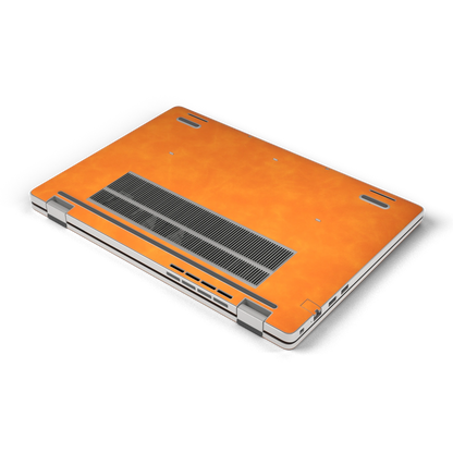 Orange scrub-textured synthetic leather Dell business laptop skin, d bottom view. Rendered on Dell Pro 16 PC16250 as a reference; exact cut layout follows the selected model and coverage.