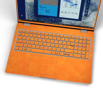 Orange scrub-textured synthetic leather Dell business laptop skin, keyboard wide view. Rendered on Dell Pro 16 PC16250 as a reference; exact cut layout follows the selected model and coverage.