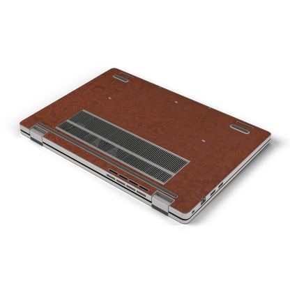 Oblique bottom view of Classic Brown Hibiscus synthetic leather skin, rendered on Dell Pro 16 (PC16250) as a model reference.
