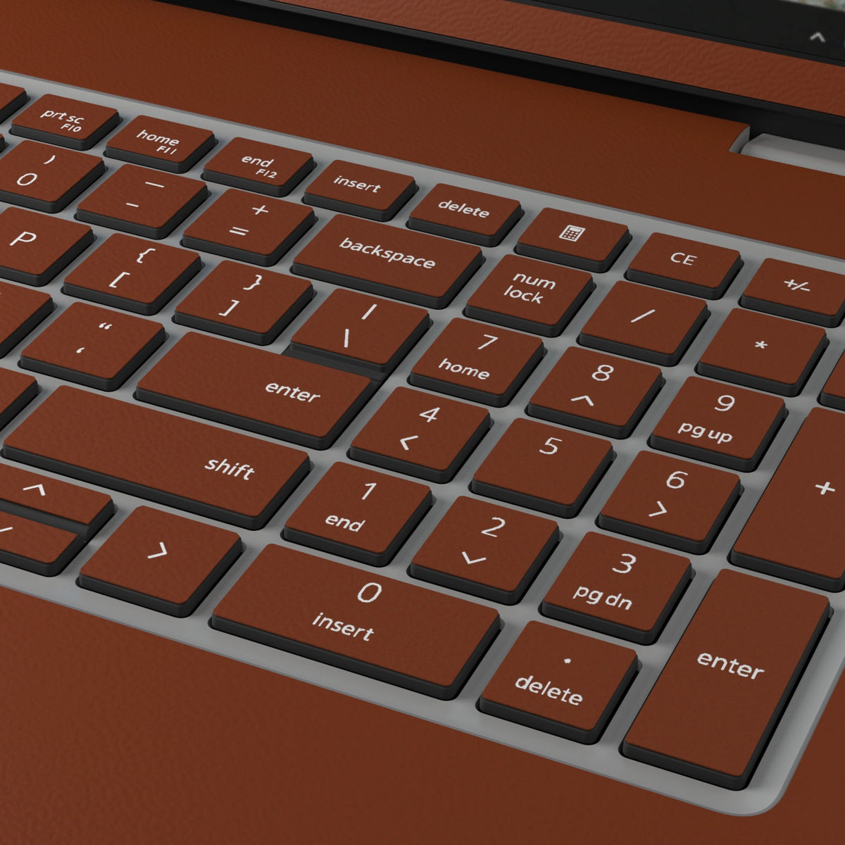 Keycap and leather-texture close-up of Classic Brown Hibiscus synthetic leather skin, rendered on Dell Pro 16 (PC16250) as a model reference.