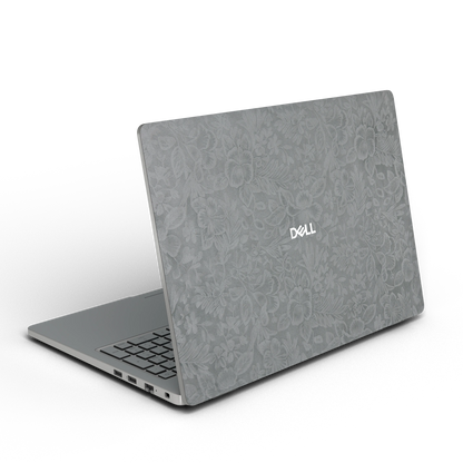 Rear three-quarter view of Classic Gray Hibiscus synthetic leather skin, rendered on Dell Pro 16 (PC16250) as a model reference.
