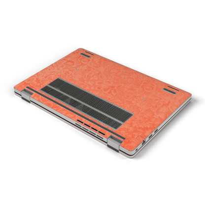 Oblique bottom view of Sunset Orange Hibiscus synthetic leather skin, rendered on Dell Pro 16 (PC16250) as a model reference.