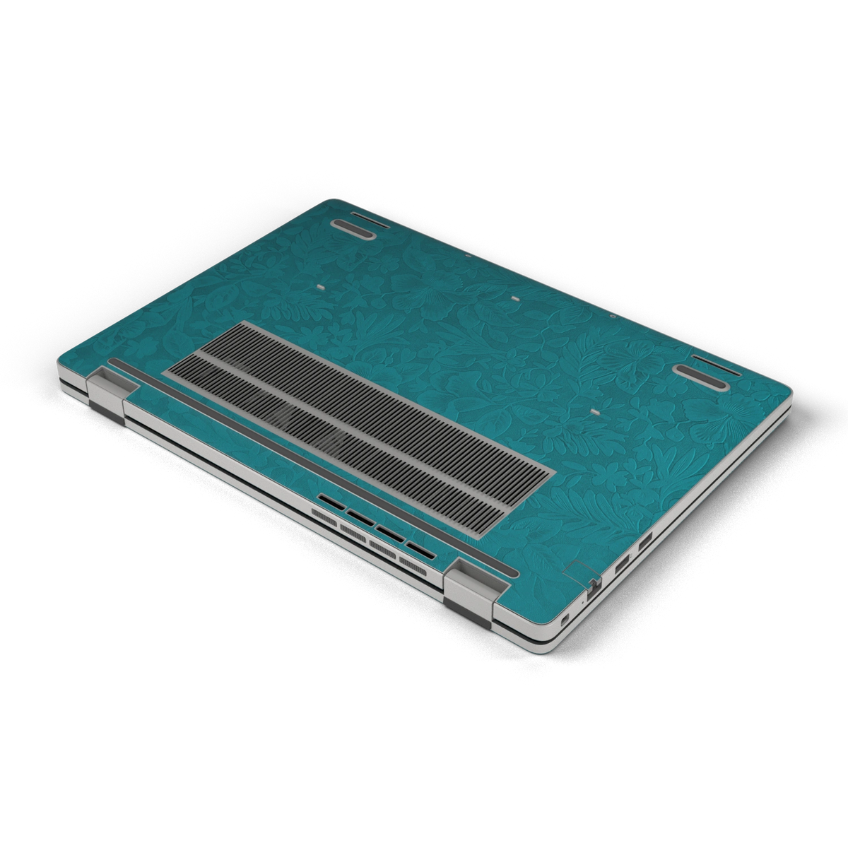 Oblique bottom view of Tropical Teal Hibiscus synthetic leather skin, rendered on Dell Pro 16 (PC16250) as a model reference.