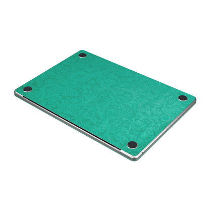 西湖苍兰 Hibiscus MacBook skin. D bottom layout illustration. MacBook Air 15.3 M3-M5 render used as a shared material and installation illustration; actual cutouts and included pieces follow the selected model and Coverage. Device not included.
