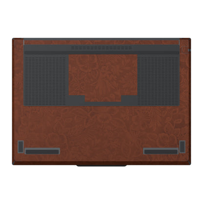 Dwantran Hibiscus Lenovo laptop skin in Classic Brown, showing a bottom view of the laptop on a white background.