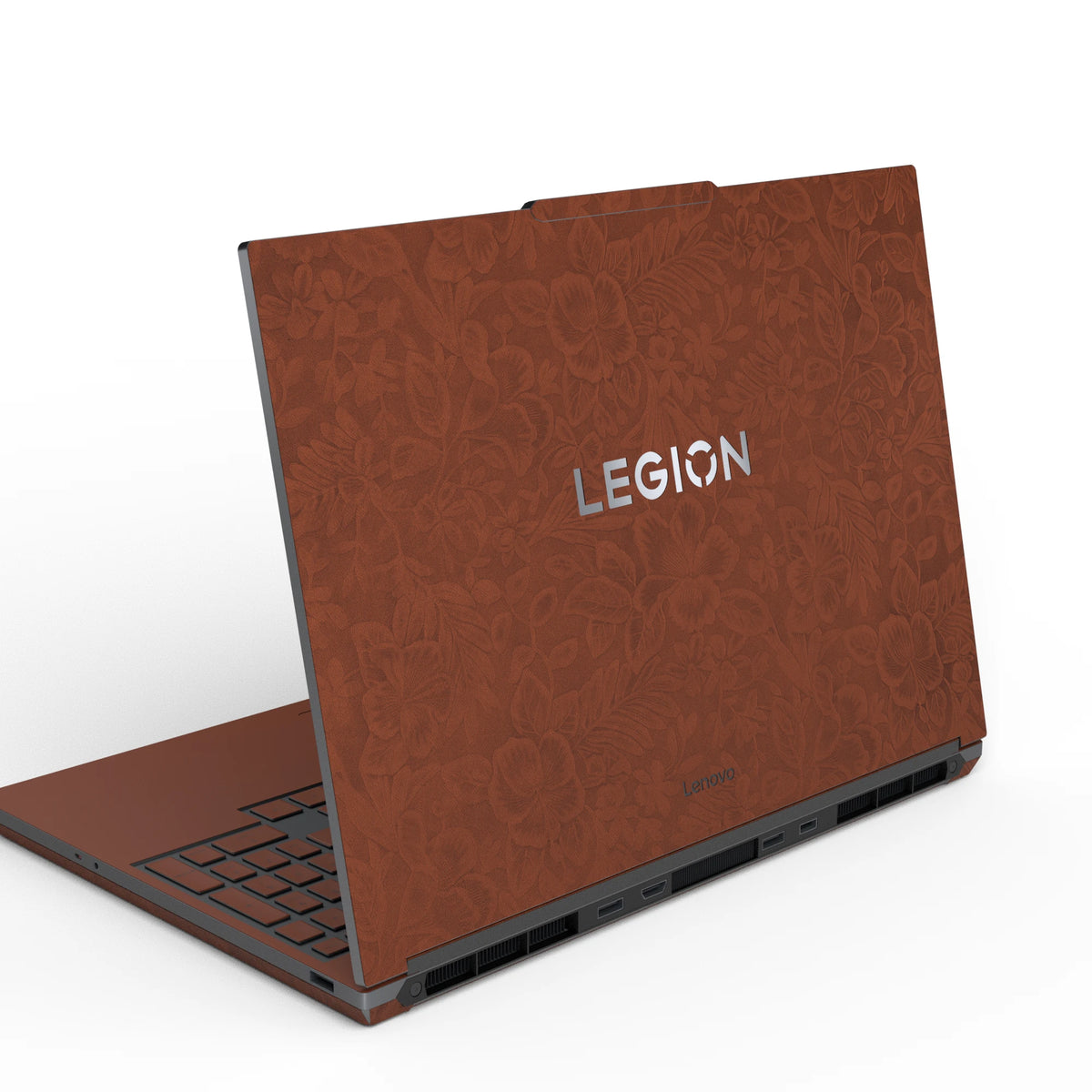 Dwantran Hibiscus Lenovo laptop skin in Classic Brown, showing an oblique view of the laptop lid on a white background.