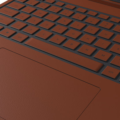 Dwantran Hibiscus Lenovo laptop skin in Classic Brown, showing a close-up of the textured pattern on a white background.