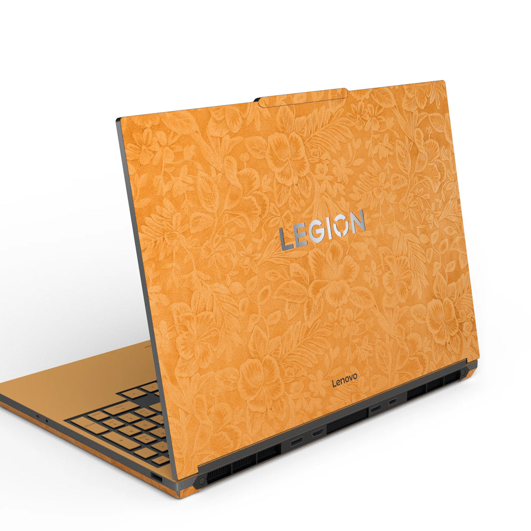 Dwantran Hibiscus Lenovo laptop skin in Sunny Yellow, showing an oblique view of the laptop lid on a white background.