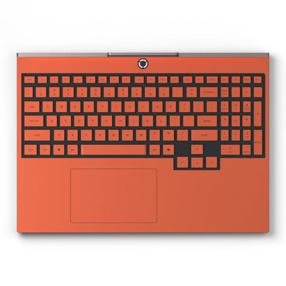 Dwantran Hibiscus Lenovo laptop skin in Sunset Orange, showing a top view of the keyboard area on a white background.