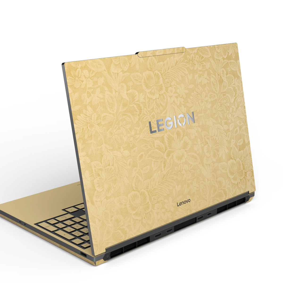Dwantran Hibiscus Lenovo laptop skin in Vintage Gold, showing an oblique view of the laptop lid on a white background.