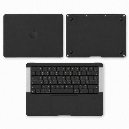 Black plain-colour MacBook skin coverage illustration: top lid, inside, keycap stickers and bottom. Cut layout varies by model.