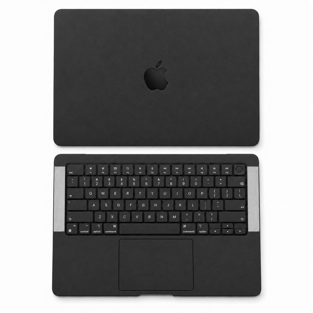 Black plain-colour MacBook skin coverage illustration: top lid, inside and keycap stickers. Cut layout varies by model.