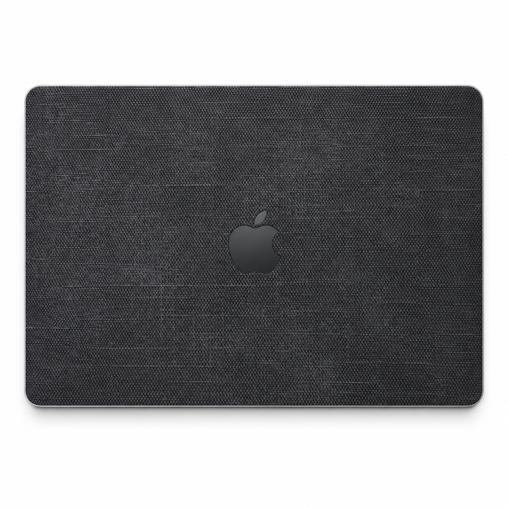 Black cotton denim fabric MacBook top lid coverage illustration; cut layout varies by model.