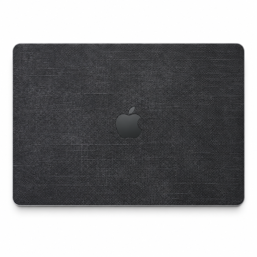 Black cotton denim fabric MacBook top lid coverage illustration; cut layout varies by model.