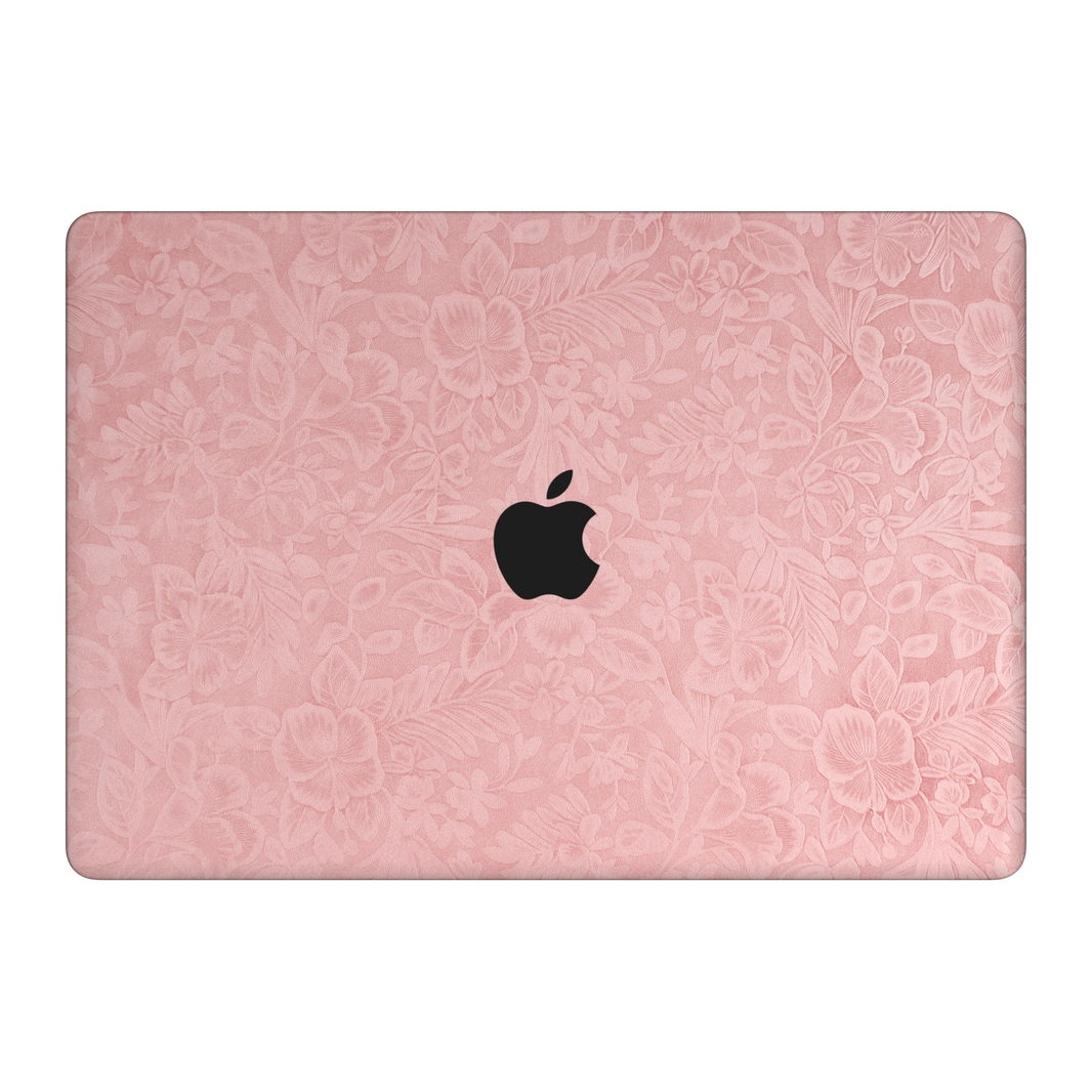 Blush Pink Hibiscus. Embossed A top-lid material illustration. Rendered on MacBook Air 15.3-inch M3–M5; actual cutouts and supplied pieces follow the selected MacBook model and coverage.