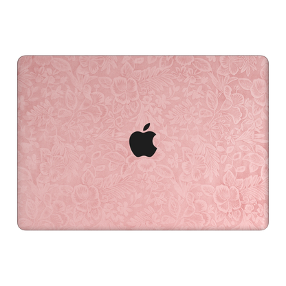 Blush Pink Hibiscus. Embossed A top-lid material illustration. Rendered on MacBook Air 15.3-inch M3–M5; actual cutouts and supplied pieces follow the selected MacBook model and coverage.