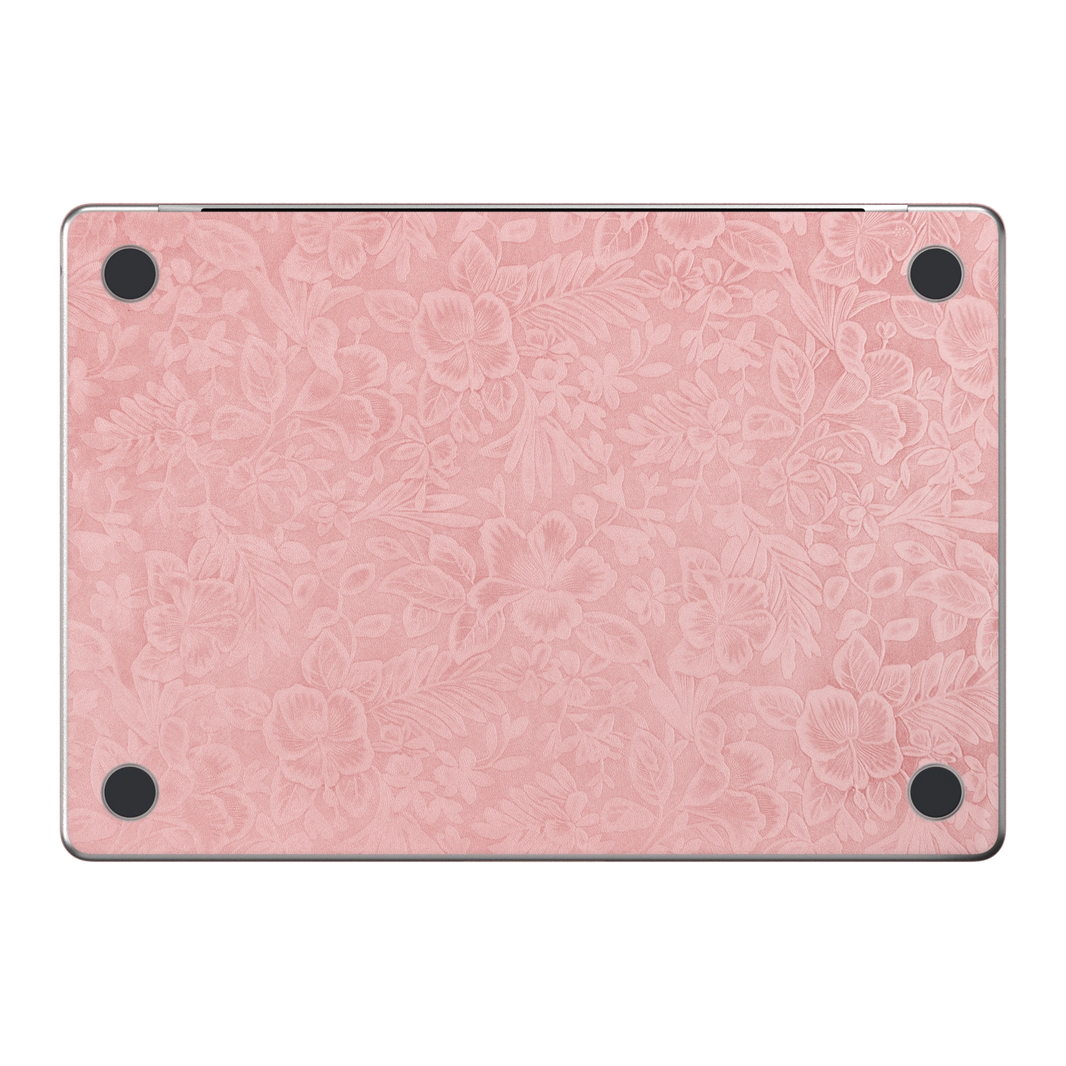 Blush Pink Hibiscus. Embossed D bottom material illustration. Rendered on MacBook Air 15.3-inch M3–M5; actual cutouts and supplied pieces follow the selected MacBook model and coverage.