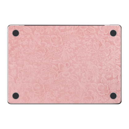 Blush Pink Hibiscus. Embossed D bottom material illustration. Rendered on MacBook Air 15.3-inch M3–M5; actual cutouts and supplied pieces follow the selected MacBook model and coverage.