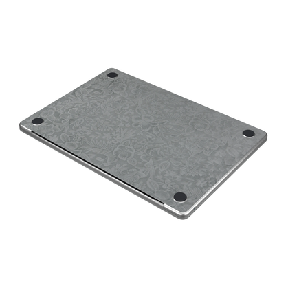 Classic Gray Hibiscus synthetic leather: Bottom (D) angle and texture detail; bottom included only with bottom coverage. Rendered on Air 15.3-inch M3-M5 as shared Air/Pro/Neo material reference; exact cutouts follow selected model.