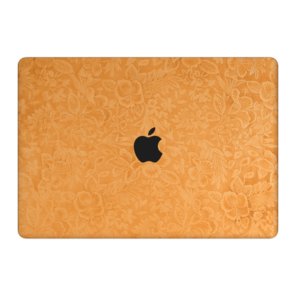 Sunny Yellow Hibiscus embossed synthetic leather material illustration on the top lid (A). Rendered on MacBook Air 15.3-inch M3-M5; actual cutouts follow the selected MacBook model.