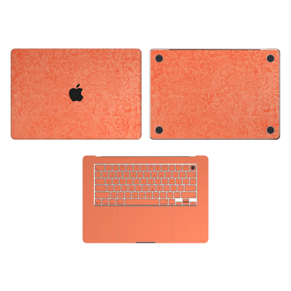 Sunset Orange Hibiscus synthetic leather: Top Inside & Bottom Wraps coverage guide: embossed top lid (A) and bottom (D), plain inside (C) and keycap stickers. No screen-edge (B) pieces. Rendered on Air15.3 M3-M5 as a shared material reference for Air, Pro and Neo; actual cutouts follow the selected model.
