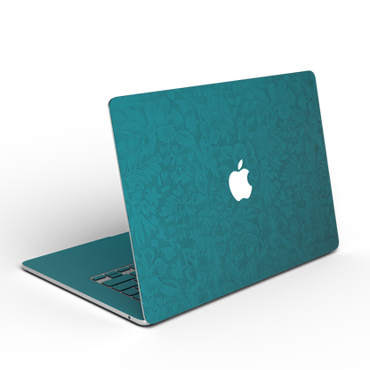 Tropical Teal Hibiscus synthetic leather: Rear installation-effect illustration showing embossed exterior material. Rendered on Air15.3 M3-M5 as a shared material reference for Air, Pro and Neo; actual cutouts follow the selected model.