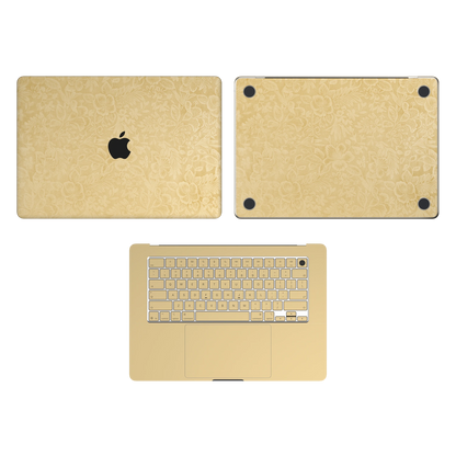 Vintage Gold Hibiscus synthetic leather: Top Inside & Bottom Wraps coverage guide: embossed top lid (A) and bottom (D), plain inside (C) and keycap stickers. No screen-edge (B) pieces. Rendered on Air 15.3-inch M3-M5 as shared Air/Pro/Neo material reference; exact cutouts follow selected model.