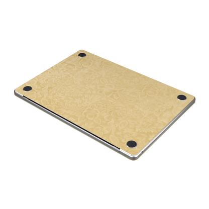 Vintage Gold Hibiscus synthetic leather: Bottom (D) angle and texture detail; bottom included only with bottom coverage. Rendered on Air 15.3-inch M3-M5 as shared Air/Pro/Neo material reference; exact cutouts follow selected model.