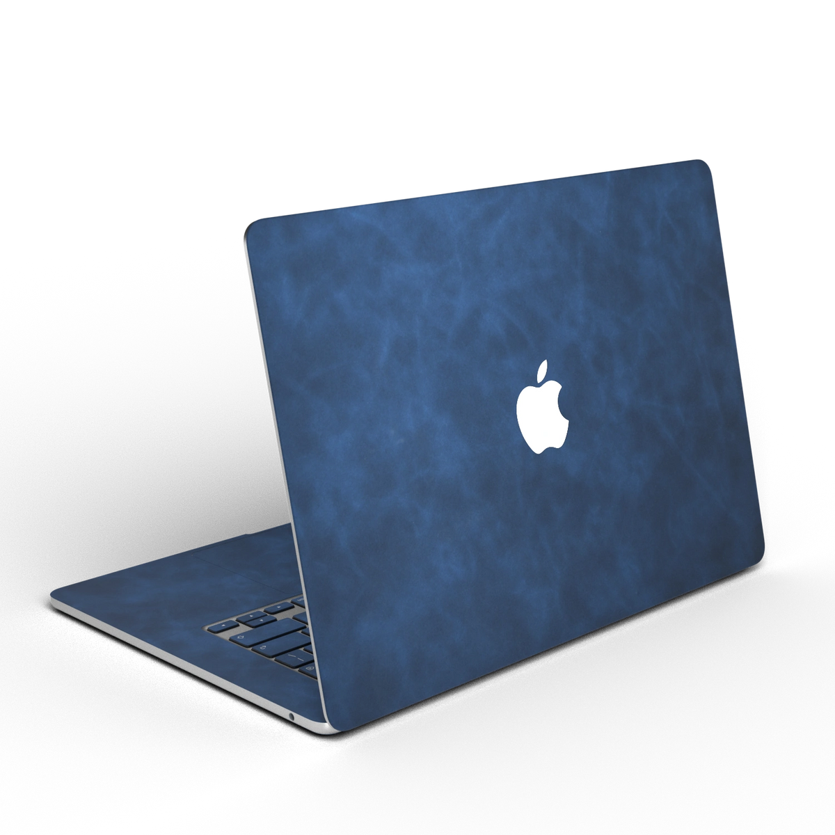 Dark Gray Blue scrub-textured synthetic leather MacBook skin. Open rear angle material illustration. Air 15.3 M3-M5 shared material/installation reference; exact cutouts and included pieces follow selected model and coverage. Laptop not included.